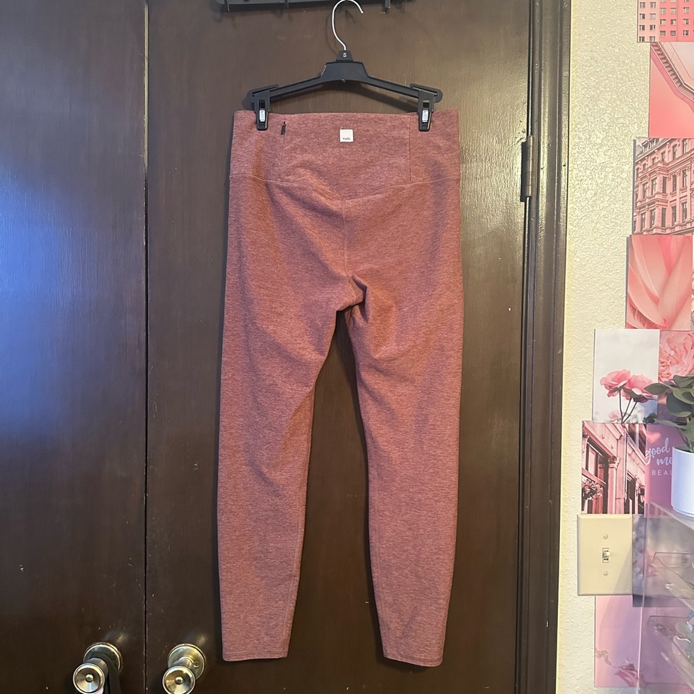 Vuori estimated size medium leggings and a beautiful rust red color.